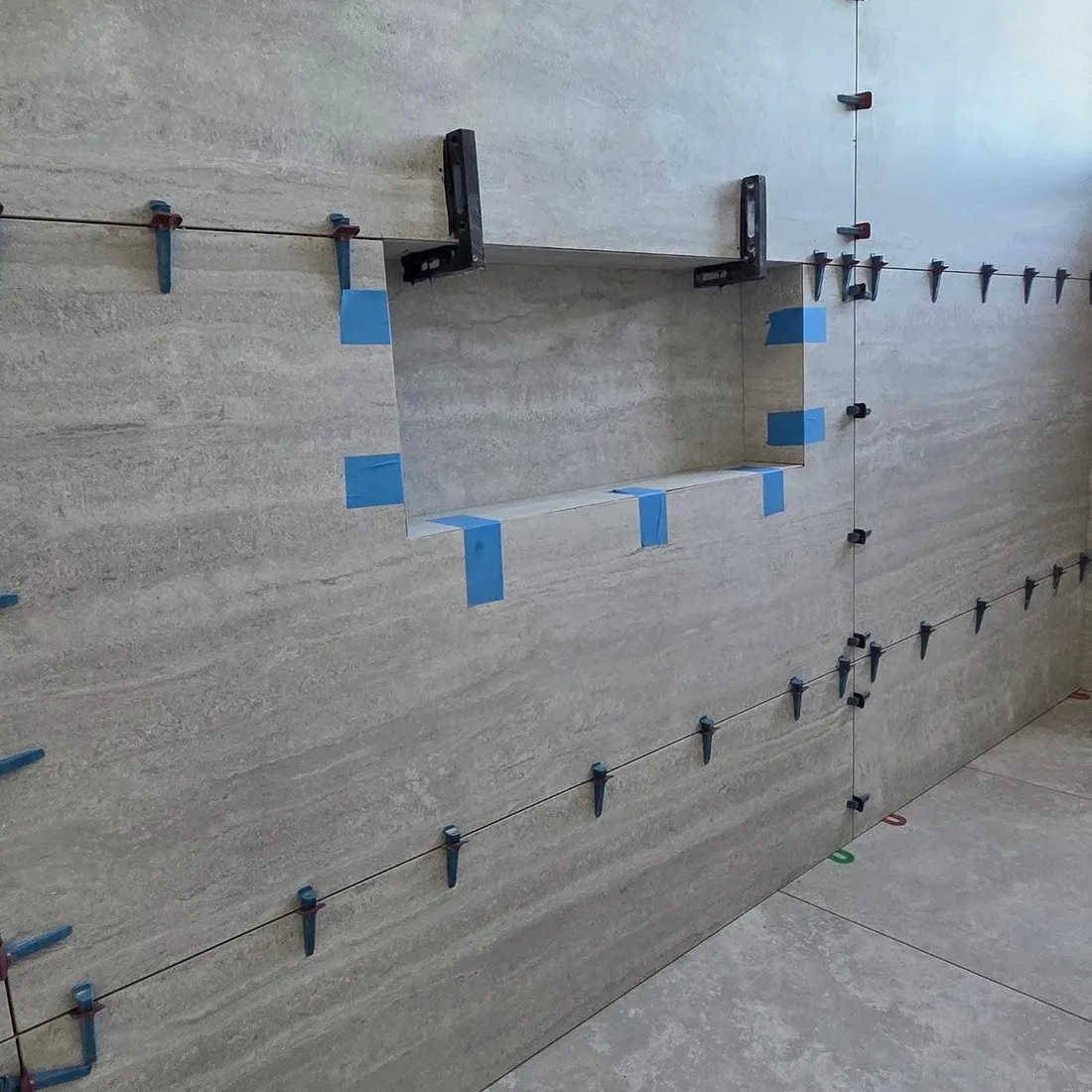 Shower shelf, framed in tile