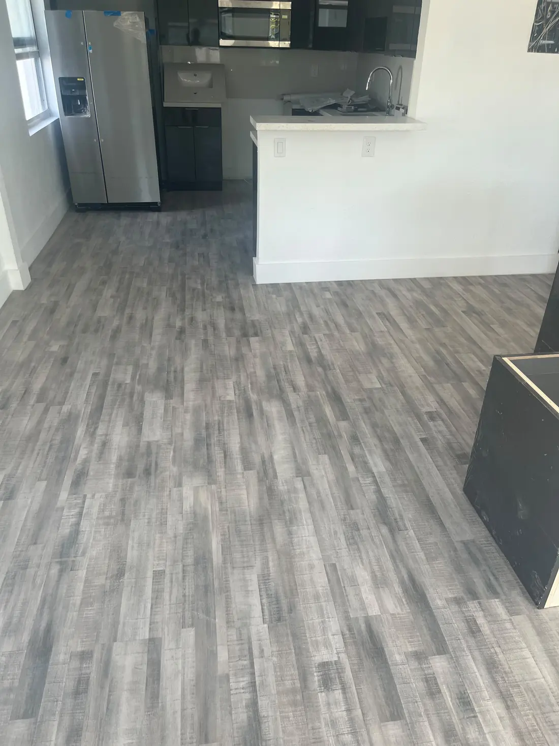 Luxury vinyl plank through the living area