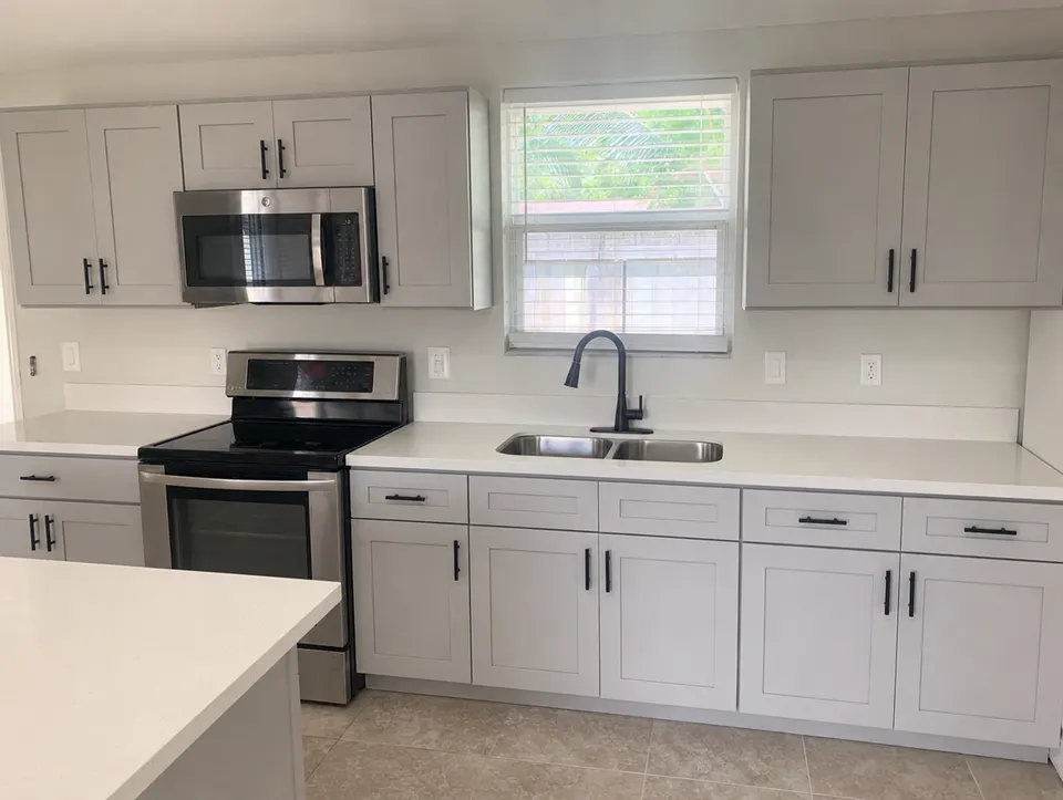 Kitchen cabinets, after the repair