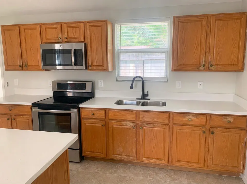 Kitchen cabinets, before the repair
